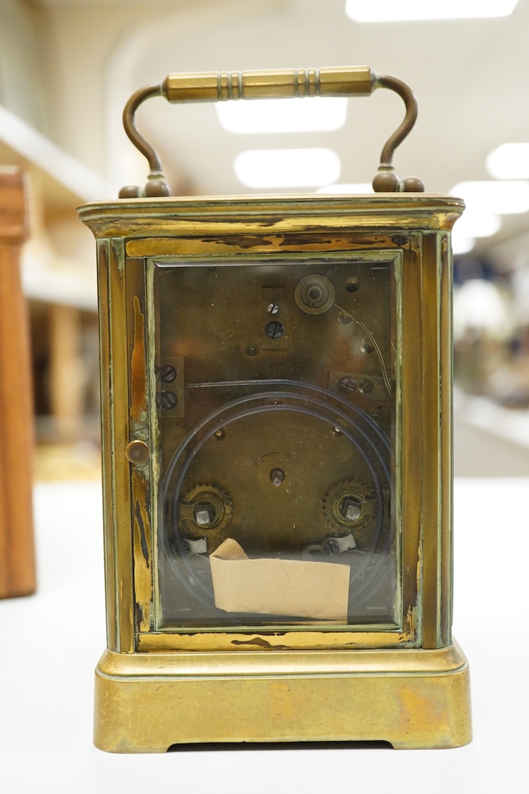 A cased brass carriage timepiece, 17.5cm high
